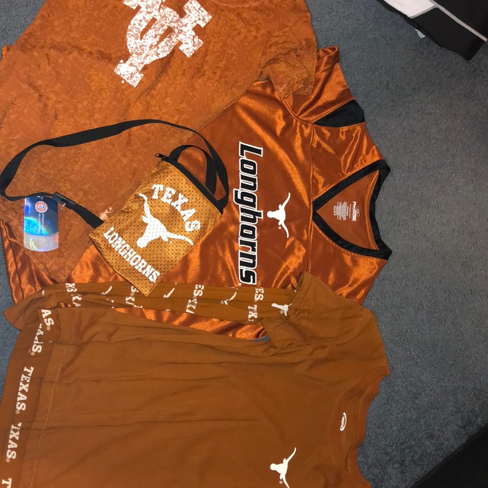 3 longhorns shirts and a game day ouch with a tag